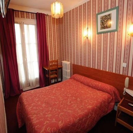 Sully Hotel Париж Стая снимка